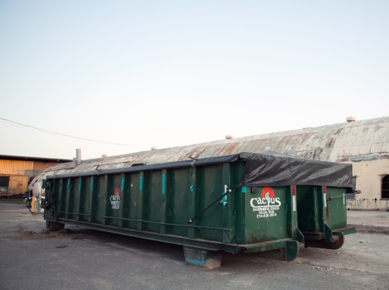 Cactus Environmental waste management roll off container in industrial worksite