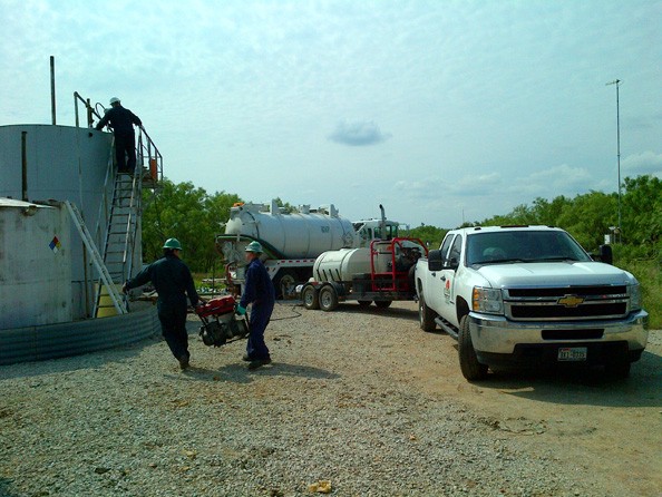 Waste disposal rental truck, trailer and tanks